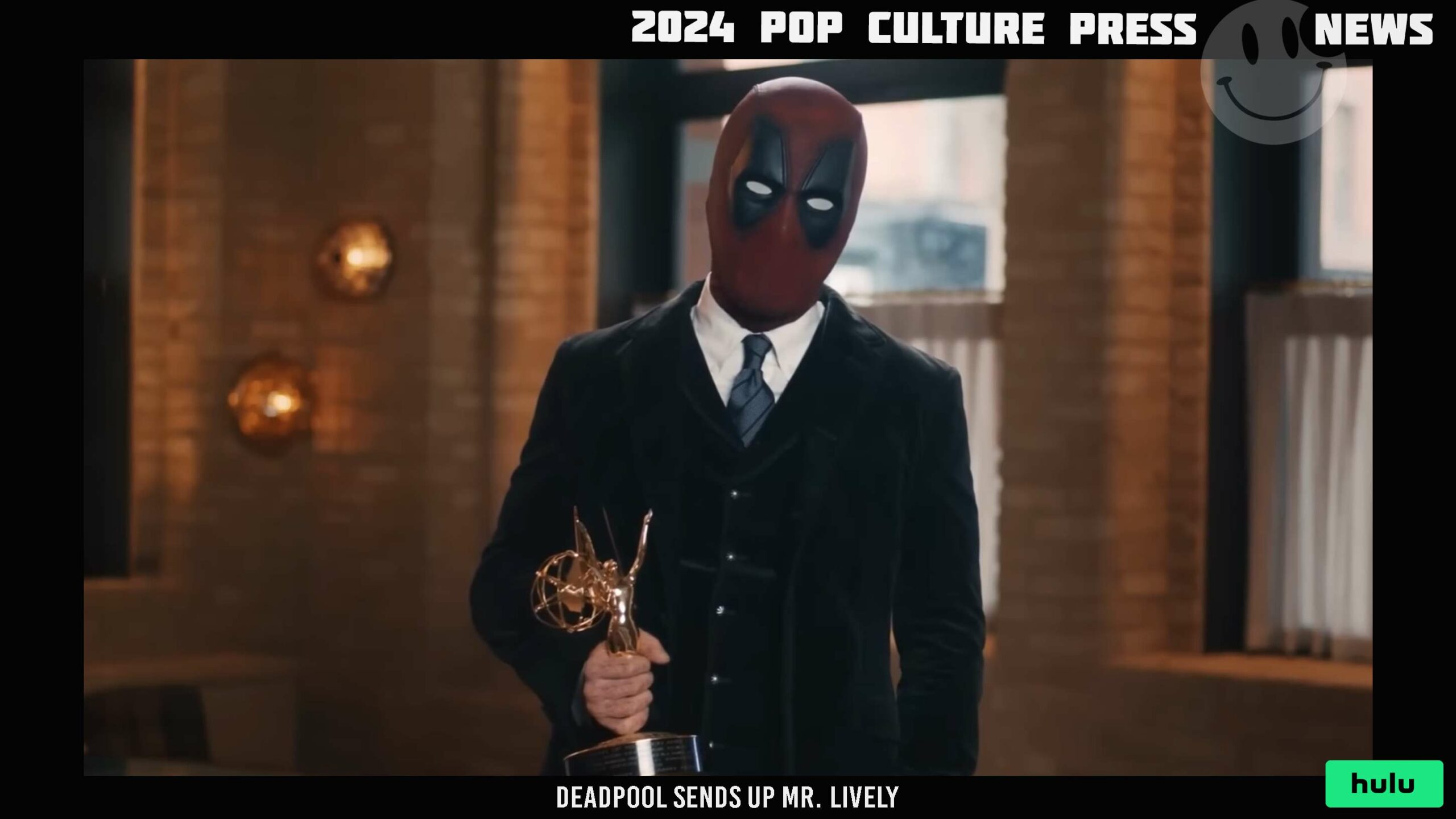 Ryan Reynolds as Deadpool, holding Hugh Jackman's broken Emmy, referring to himself as Mr. Lively, promoting 'Welcome to Wrexham